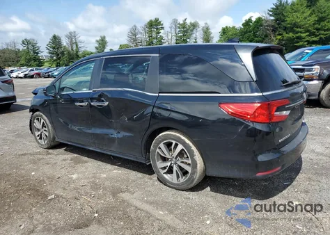 2021 Honda Odyssey Touring from USA, damaged, VIN 5FNRL6H85MB021963